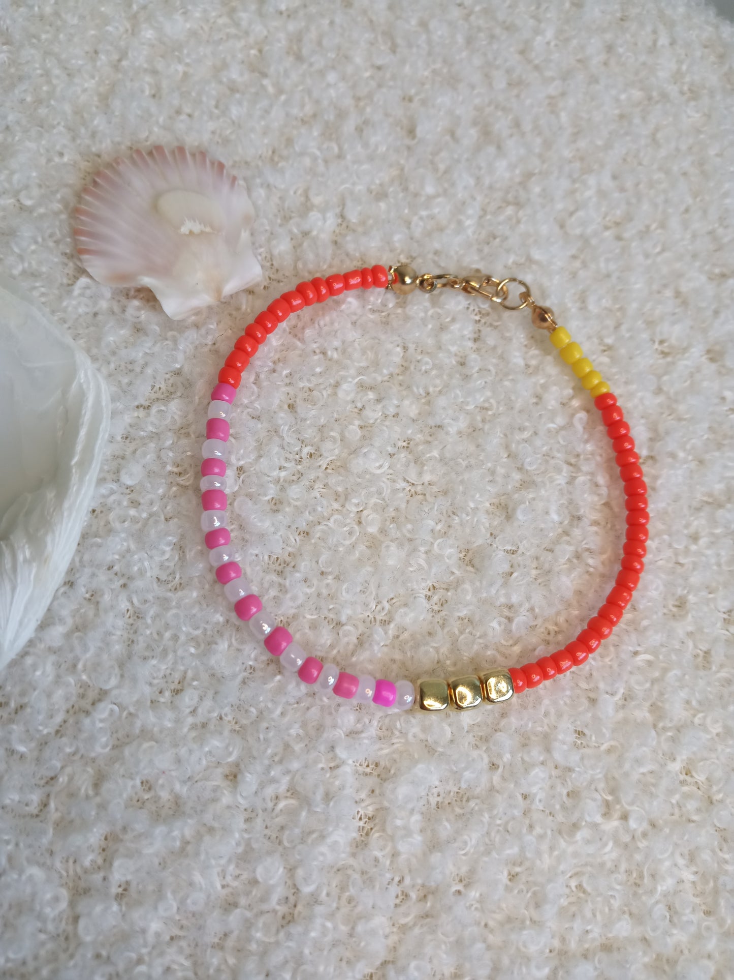 Wunderschönes handgemachtes farbenfrohes Armband in den Farben orange/pink/gold/perlmutt/gelb