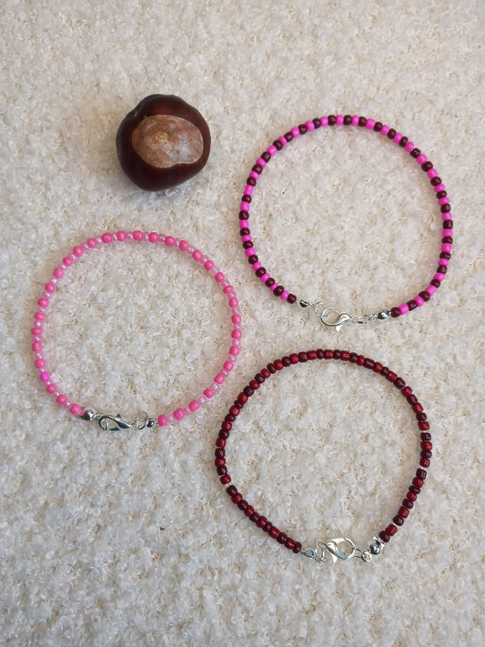 Wunderschöne filigrane Armbänder in den Farbvarianten bordeaux/pink, pink/rosé und bordeaux/karminrot
